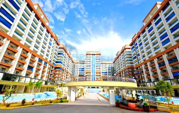 Светлая квартира 1+1 с выходом в сад в развитом комплексе