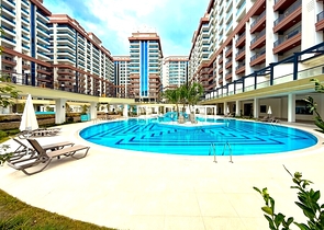 Светлая квартира 1+1 с выходом в сад в развитом комплексе