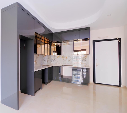 Современная 1+1 квартира в развитом жилом проекте