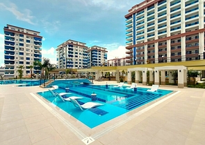 Современная 1+1 квартира в развитом жилом проекте