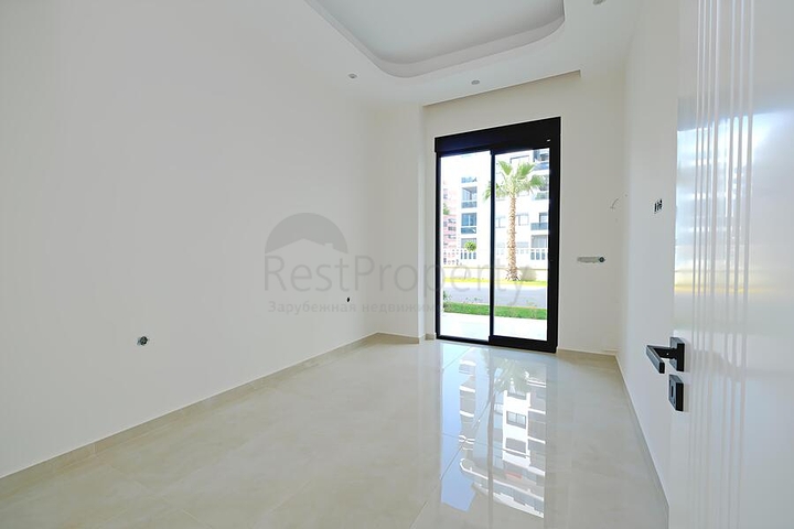 Современная квартира 1+1 с садовым этажом в комплексе с богатой инфраструктурой