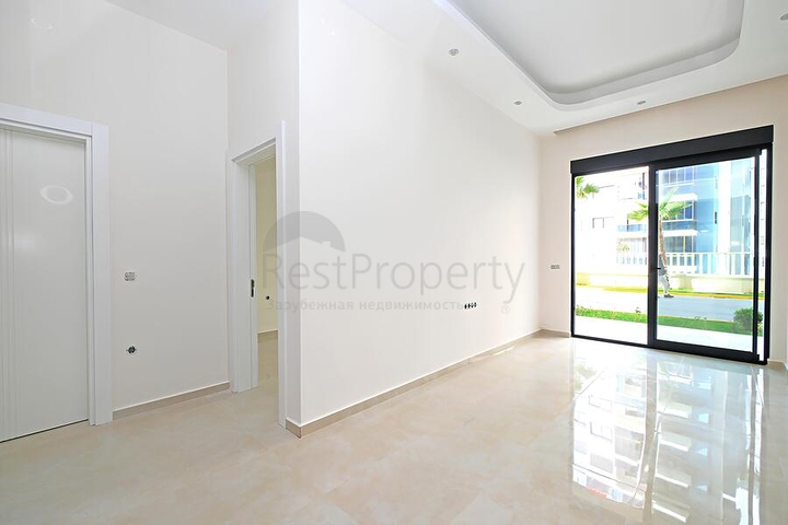 Современная квартира 1+1 с садовым этажом в комплексе с богатой инфраструктурой