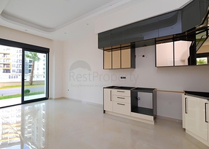 Современная квартира 1+1 с садовым этажом в комплексе с богатой инфраструктурой