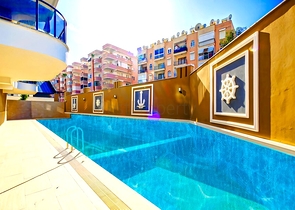 Светлая квартира 2+1 в современном жилом доме в районе Махмутлар