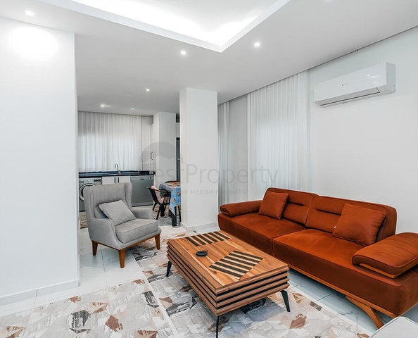 Уютная меблированная квартира 1+1 в современном доме района Клеопатра