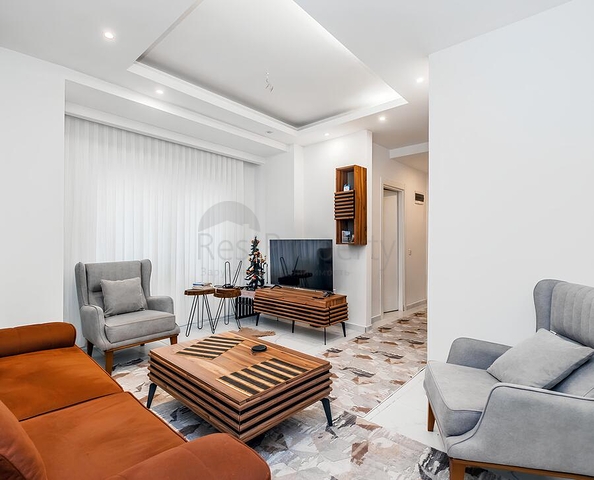 Уютная меблированная квартира 1+1 в современном доме района Клеопатра