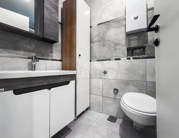 Уютная меблированная квартира 1+1 в современном доме района Клеопатра