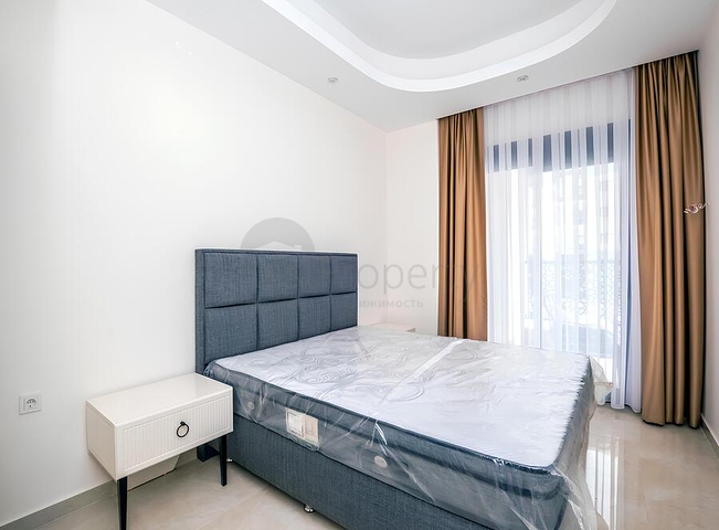 Современная меблированная квартира с развитой инфраструктурой в Махмутларе