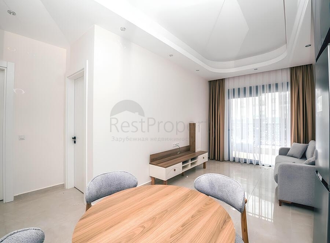 Современная меблированная квартира с развитой инфраструктурой в Махмутларе