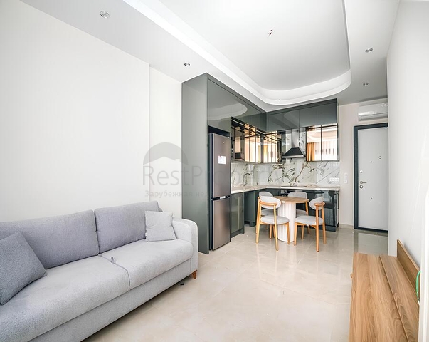 Современная меблированная квартира с развитой инфраструктурой в Махмутларе