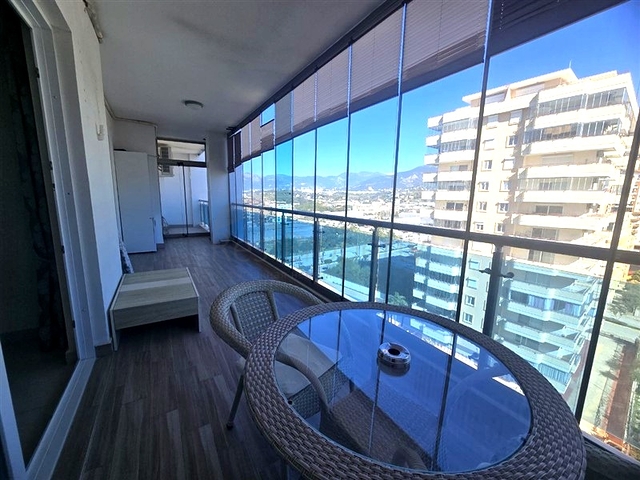 Светлая квартира 1+1 на высоком этаже в районе Махмутлар