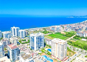 Светлая квартира 1+1 на высоком этаже в районе Махмутлар