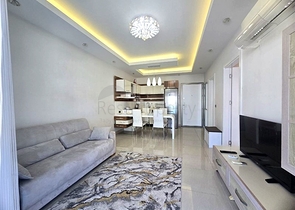 Светлая квартира 1+1 на высоком этаже в районе Махмутлар