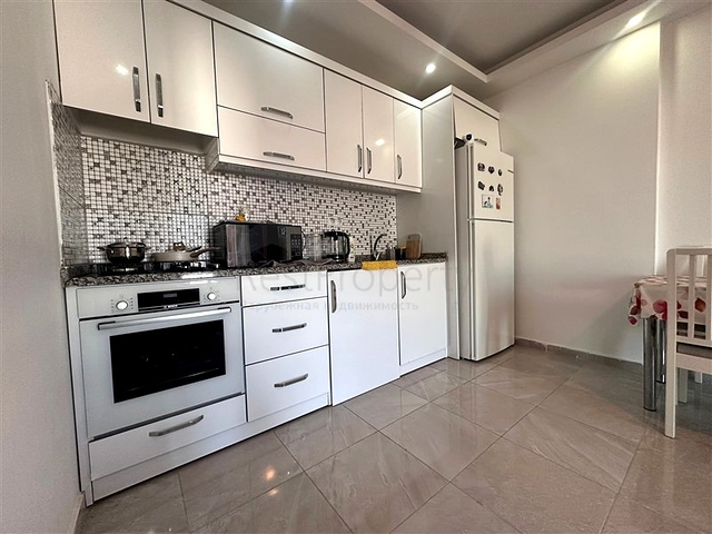 Квартира 1+1 с мебелью и инфраструктурой в районе Конаклы