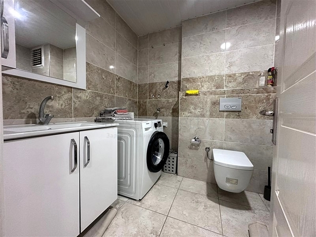 Квартира 1+1 с мебелью и инфраструктурой в районе Конаклы