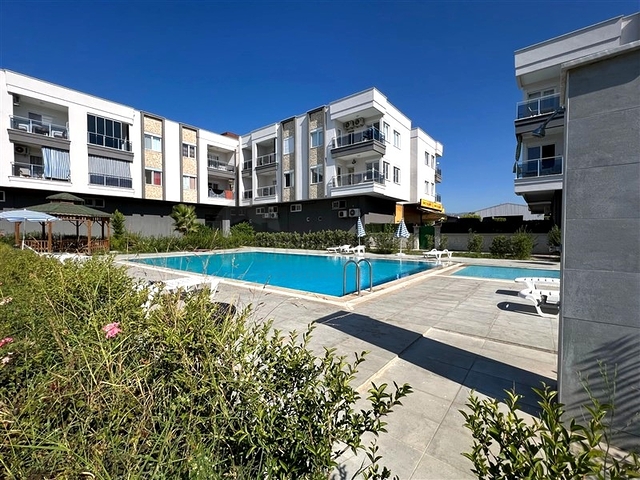 Квартира 1+1 с мебелью и инфраструктурой в районе Конаклы