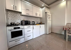 Квартира 1+1 с мебелью и инфраструктурой в районе Конаклы