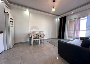 Квартира 1+1 с мебелью и инфраструктурой в районе Конаклы