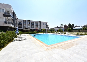 Квартира 1+1 с мебелью и инфраструктурой в районе Конаклы