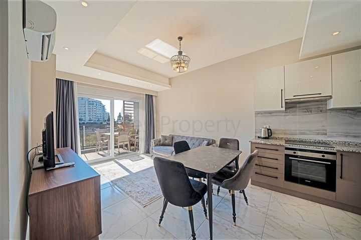 Квартира 1+1 с развитой инфраструктурой в районе Авсаллар