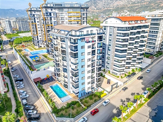 Квартира 1+1 с полной инфраструктурой комплекса в районе Махмутлар