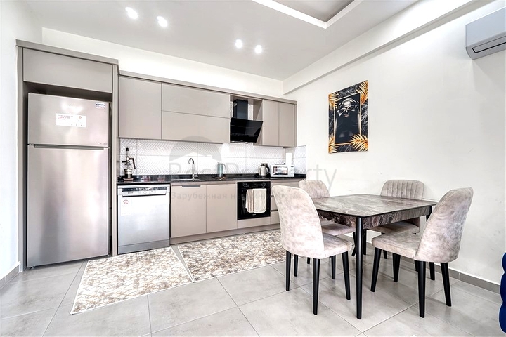 Квартира 1+1 с полной инфраструктурой комплекса в районе Махмутлар