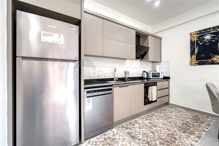 Квартира 1+1 с полной инфраструктурой комплекса в районе Махмутлар