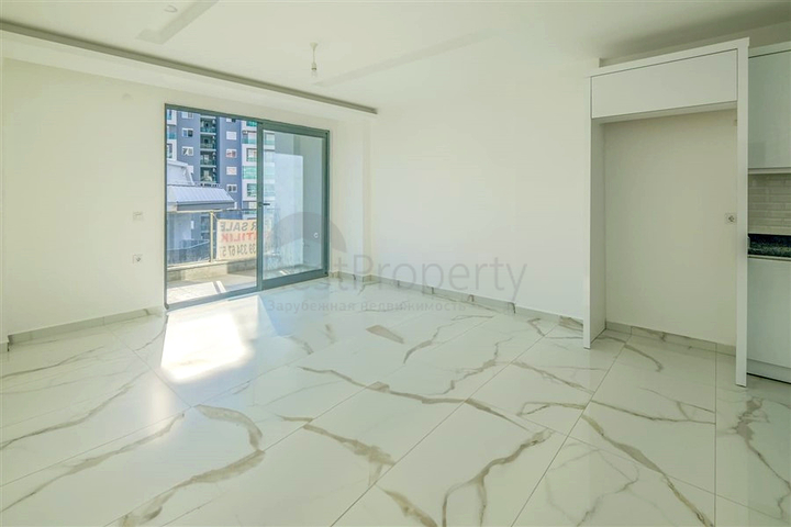 Квартира 1+1 с балконом и инфраструктурой в районе Махмутлар