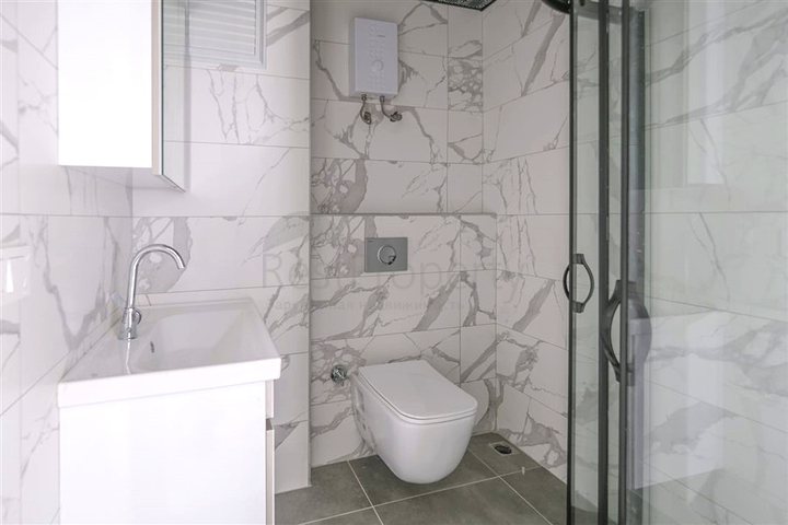 Квартира 1+1 с балконом и инфраструктурой в районе Махмутлар