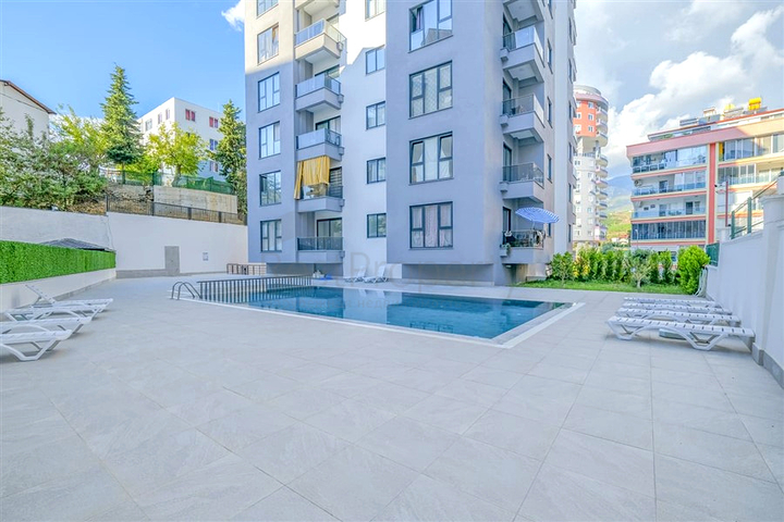 Квартира 1+1 с балконом и инфраструктурой в районе Махмутлар