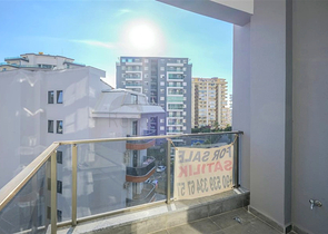 Квартира 1+1 с балконом и инфраструктурой в районе Махмутлар