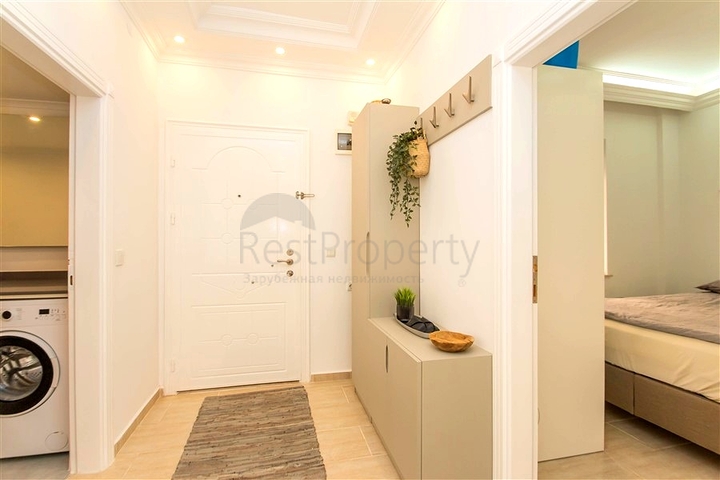 Квартира 2+1 с террасой и бассейном в районе Клеопатра