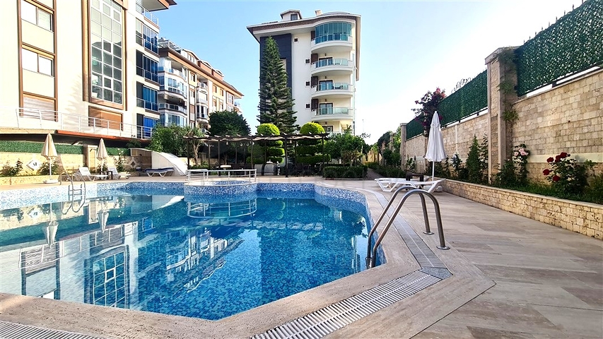 Квартира 2+1 с бассейнами и инфраструктурой комплекса в районе Кестель