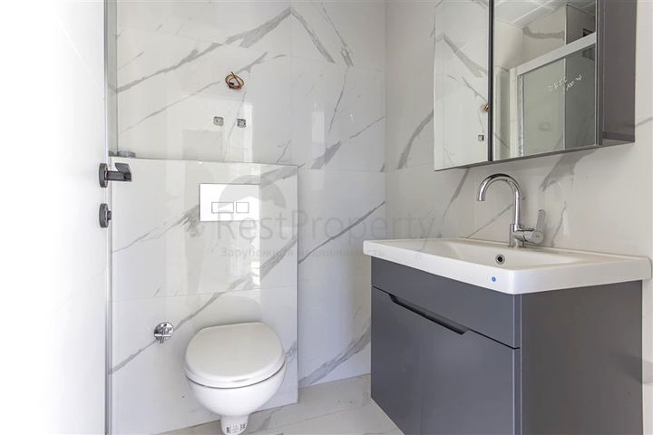 Квартира 1+1 с инфраструктурой в районе Махмутлар