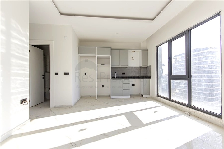 Квартира 1+1 с инфраструктурой в районе Махмутлар