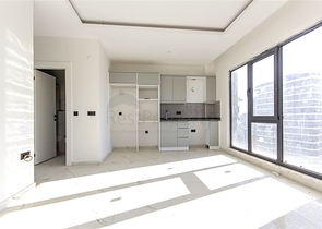 Квартира 1+1 с инфраструктурой в районе Махмутлар