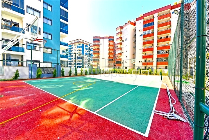 Современная квартира 1+1 с богатой инфраструктурой в районе Махмутлар