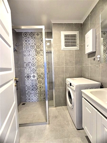 Современная квартира 1+1 с богатой инфраструктурой в районе Махмутлар