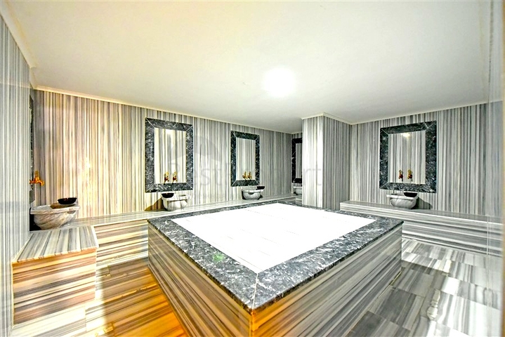 Современная квартира 1+1 с богатой инфраструктурой в районе Махмутлар