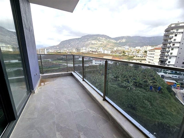 Современная квартира 1+1 с богатой инфраструктурой в районе Махмутлар