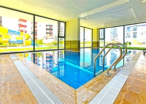 Современная квартира 1+1 с богатой инфраструктурой в районе Махмутлар