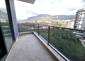 Современная квартира 1+1 с богатой инфраструктурой в районе Махмутлар