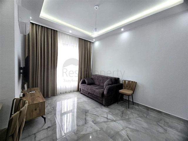 Квартира 1+1 с инфраструктурой в районе Махмутлар