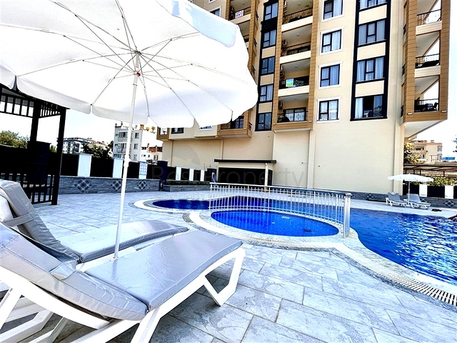 Квартира 1+1 с инфраструктурой в районе Махмутлар