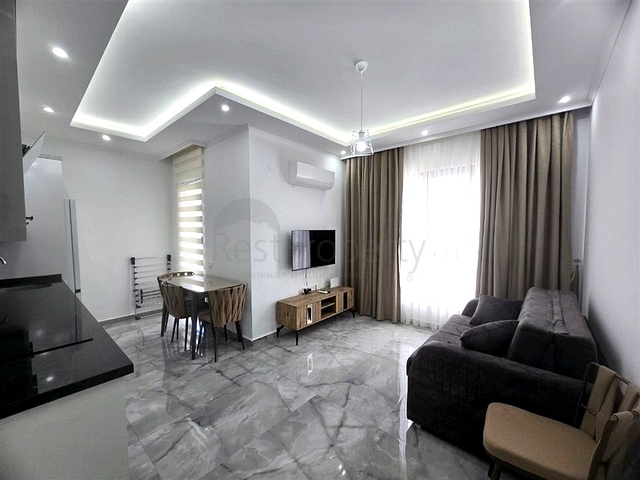 Квартира 1+1 с инфраструктурой в районе Махмутлар