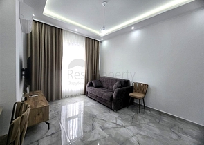 Квартира 1+1 с инфраструктурой в районе Махмутлар