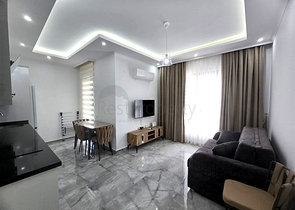 Квартира 1+1 с инфраструктурой в районе Махмутлар