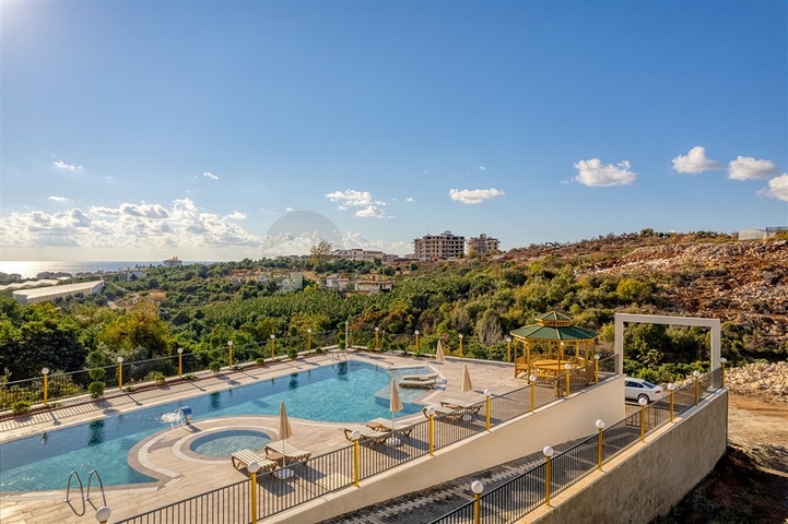 Современная квартира 1+1 в районе Кестель в новом доме