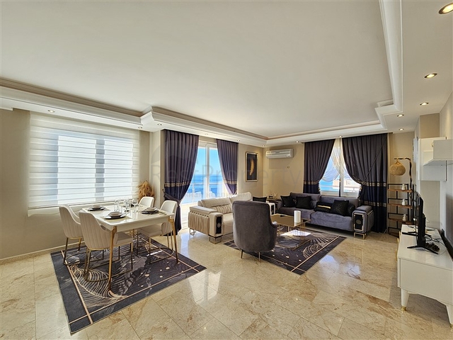 Просторная квартира 2+1 в районе Махмутлар на первой линии