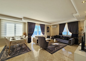 Просторная квартира 2+1 в районе Махмутлар на первой линии